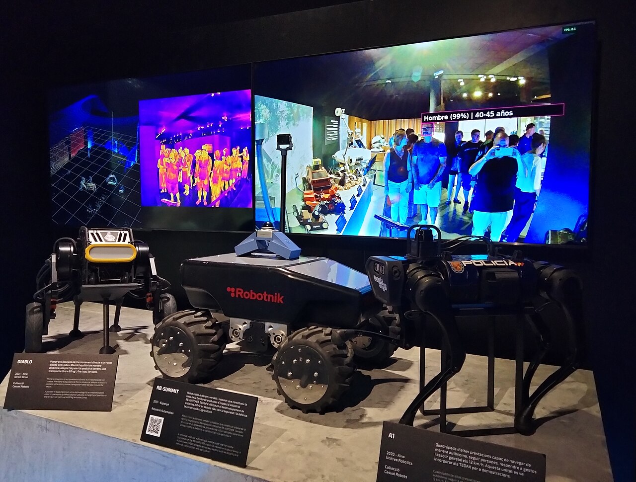 Unitree's Kung Fu Guardian Robot H2-X Debuts: Wang Xingxing Predicts Physical AI Breakthrough Within 2 Years 3 Unitree robots on display at an exhibition